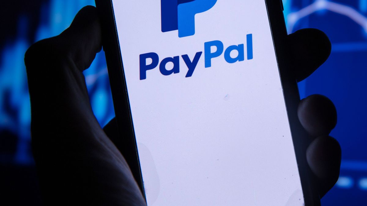 LONDON, UK - August 2021: Paypal finance service logo on a smartphone